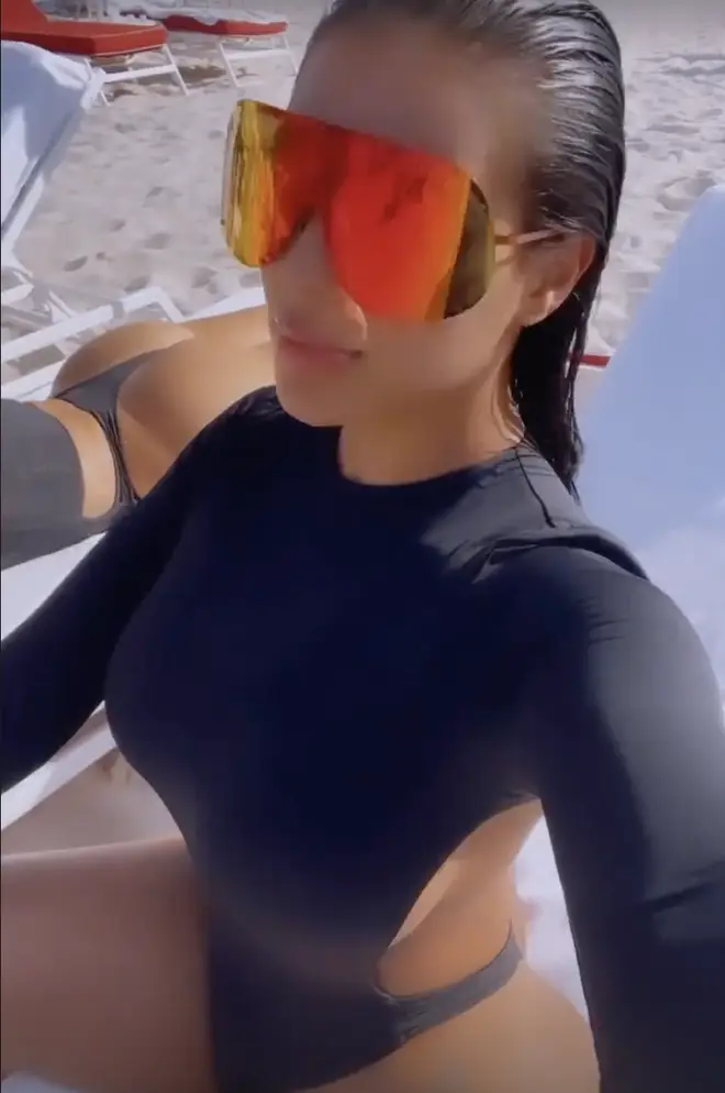 Chaney Jones shares a selfie video while chilling at the beach.