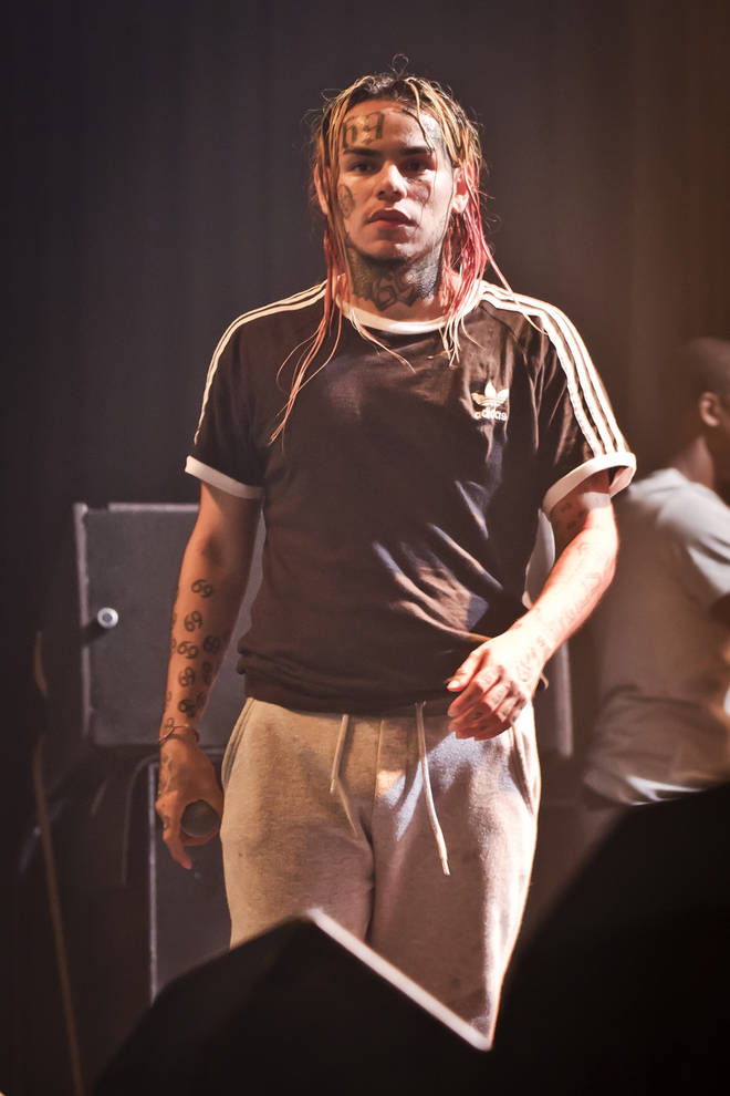 American rapper Tekashi 6ix9ine performs live on stage during a concert at the Huxleys on July 7, 2018 in Berlin, Germany