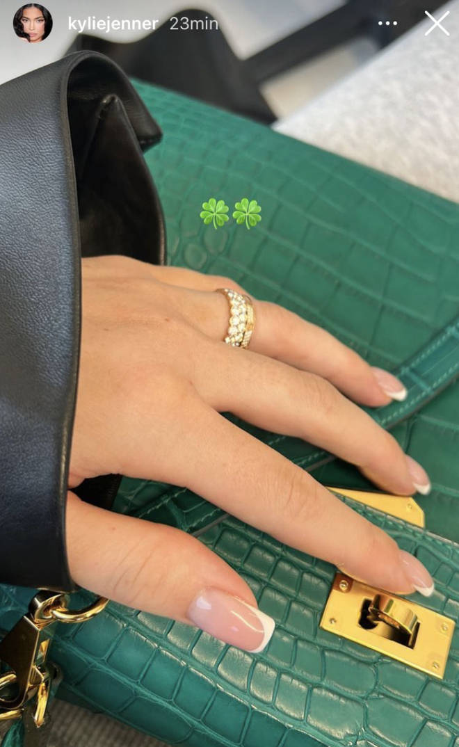 Kylie Jenner shared a photo of her left hand, wearing two diamond rings on her wedding finger.