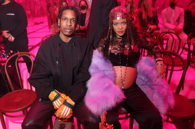 A$AP Rocky and Rihanna are pictured at the Gucci show during Milan Fashion Week Fall/Winter 2022/23 on February 25, 2022