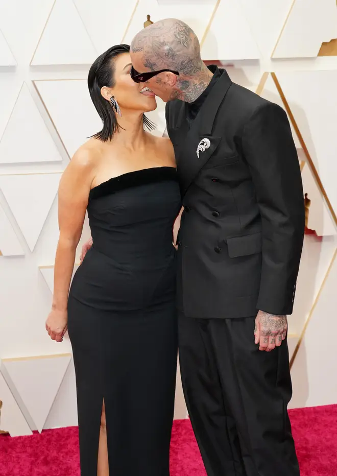 Kourtney Kardashian and Travis Barker attend the 94th Annual Academy Awards at Hollywood and Highland on March 27, 2022 in Hollywood, California