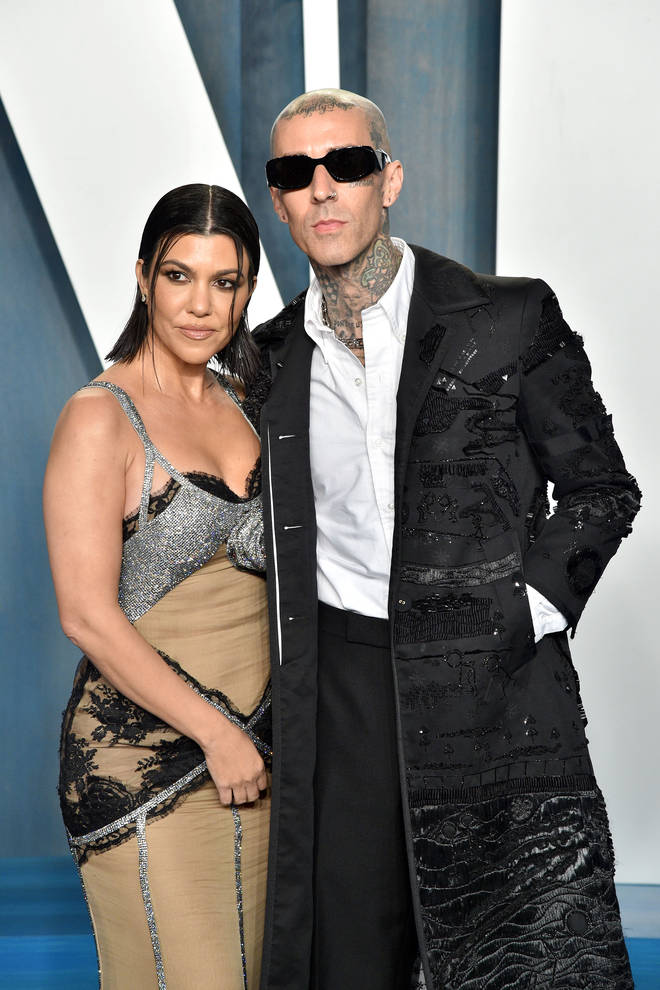 Kourtney Kardashian and Travis Barker attend the 2022 Vanity Fair Oscar Party on March 27, 2022 in Beverly Hills, California
