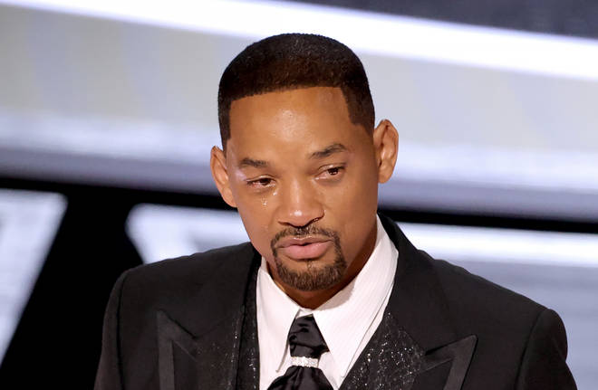Will Smith cries as he accepts his Oscar after he slapped Chris Rock on stage.