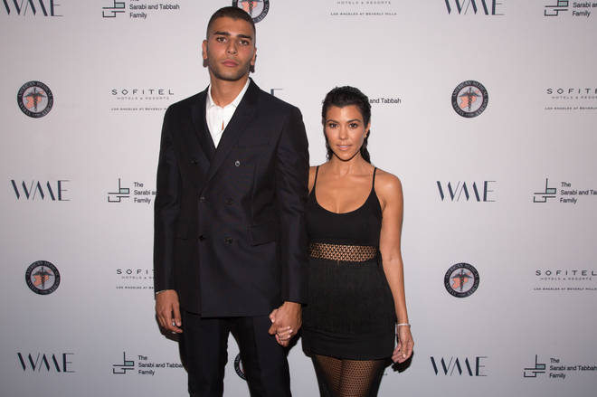 Younes Bendjima (L) and Kourtney Kardashian dated on and off from 2016 to early 2020. Younes leaked the DM from Kourtney's ex, Scott Disick.