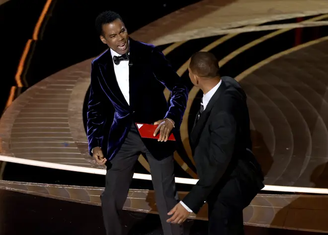 Will Smith appears to slap Chris Rock onstage during the 94th Annual Academy Awards at Dolby Theatre on March 27, 2022 in Hollywood, California