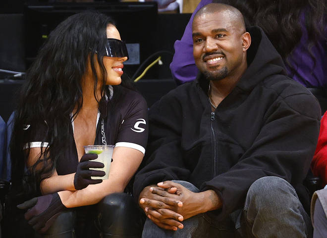 Kanye West and girlfriend Chaney Jones attend a game between the Washington Wizards and the Los Angeles Lakers in the fourth quarter at Crypto.com Arena on March 11, 2022 in Los Angeles, California