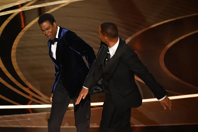 Will Smith slaps US actor Chris Rock onstage during the 94th Oscars at the Dolby Theatre in Hollywood, California on March 27, 2022