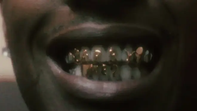A$AP Rocky's grills read 'Marry me?'
