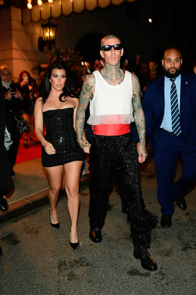 Kourtney Kardashian and Travis Barker  are seen in leaving a hotel in midtown on May 3, 2022 in New York City