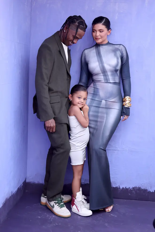 Travis Scott, Stormi Webster, and Kylie Jenner attend the 2022 Billboard Music Awards at MGM Grand Garden Arena on May 15, 2022 in Las Vegas, Nevada