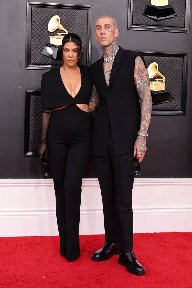 Travis Barker pictured with wife Kourtney Kardashian earlier this year