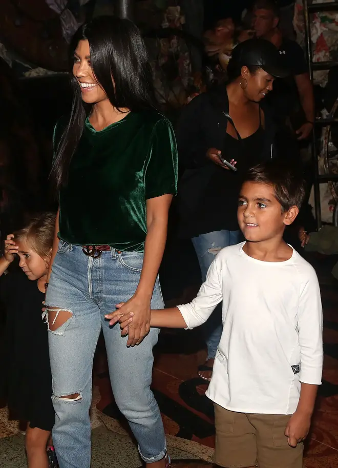 Kourtney pictured with her children Mason and Penelope.