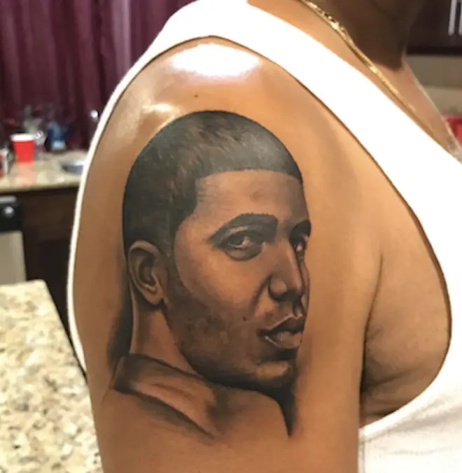 The ink on Drizzy's dad's shoulder