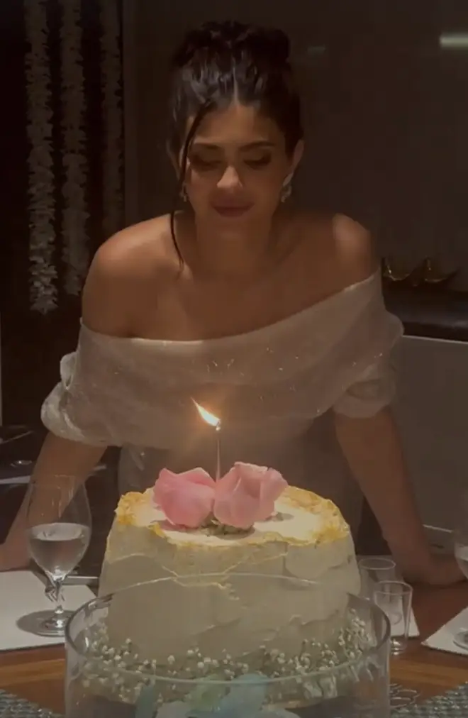 Kylie was seen blowing out a cream birthday cake as she celebrated turning 25.