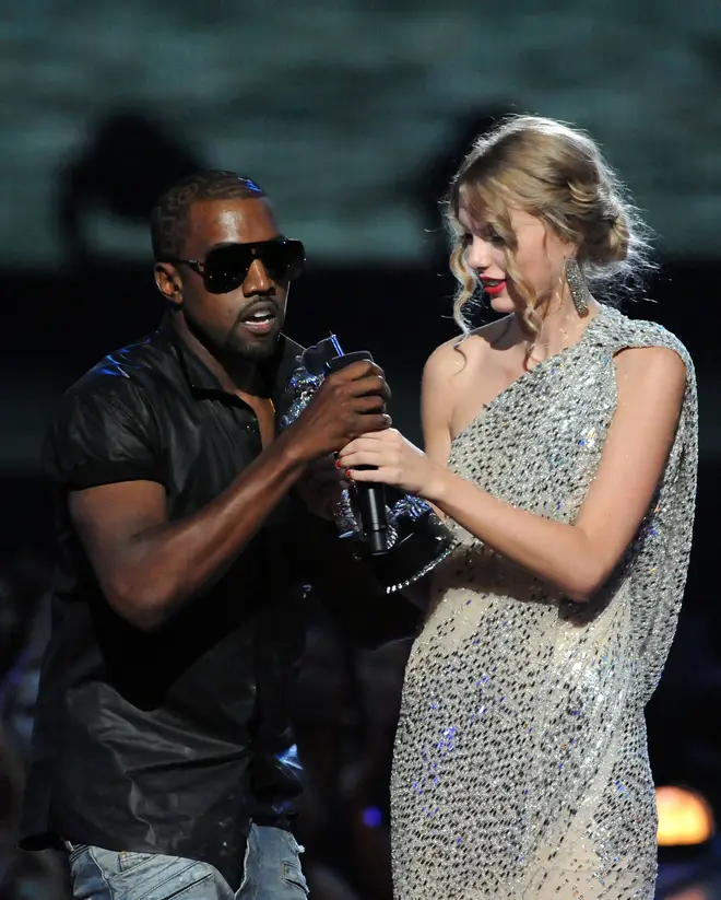 Kanye and Taylor during the infamous VMA's speech 13 years ago.