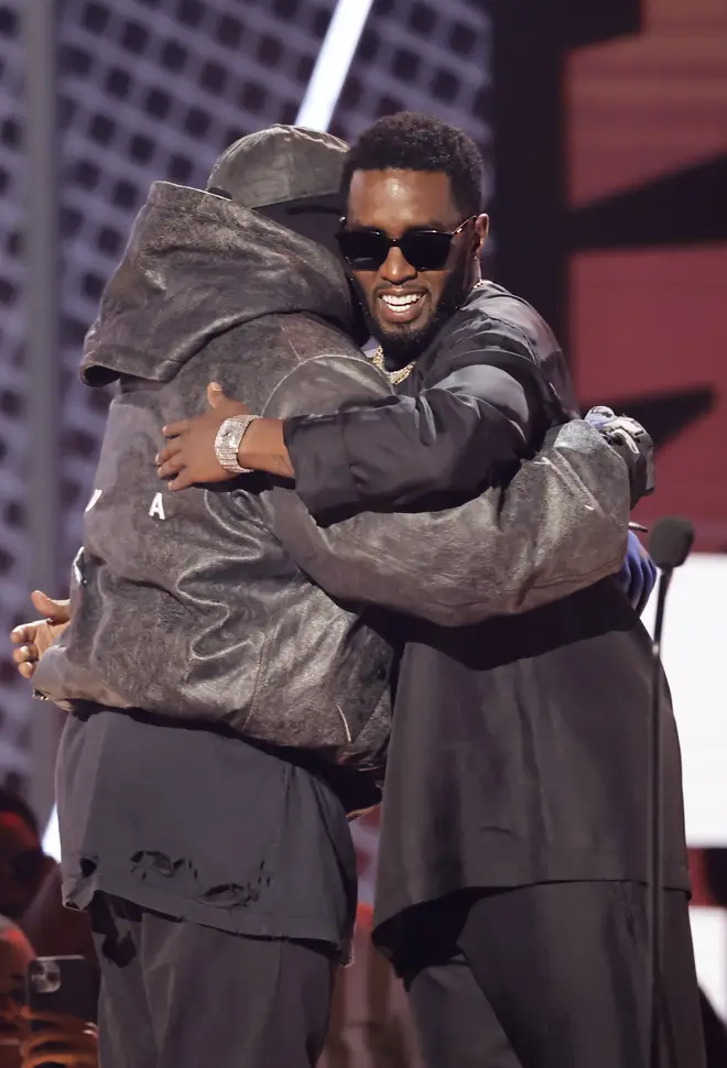 Diddy and Kanye share an embrace at the BET awards earlier this year.