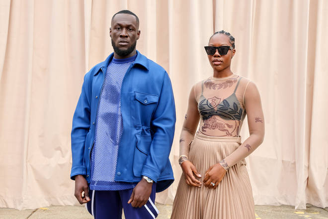Stormzy and Mel pictured at the Burberry show.