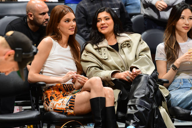 Kendall and Kylie at a basketball game.