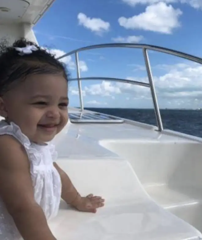Stormi on a boat travelling the world