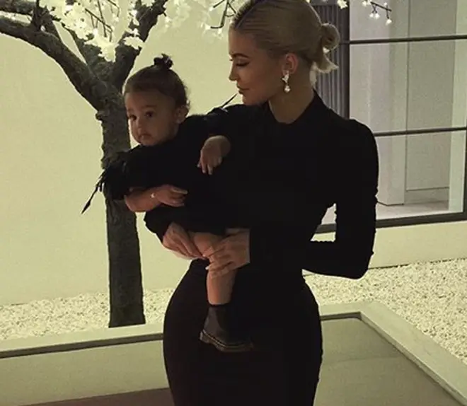 Kylie poses with Stormi