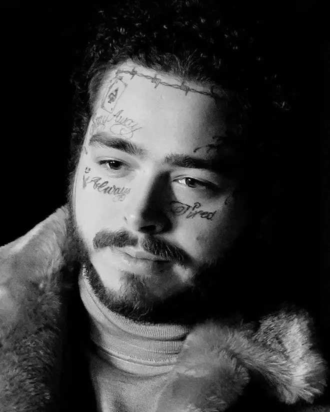 Post Malone shows a close up of the tattoo's on his face on Instagram