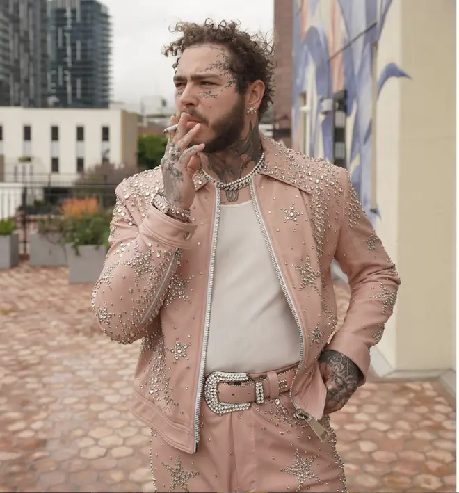 Post Malone posts photo of him smoking a cigarette just one day before he lights an expensive one on stage