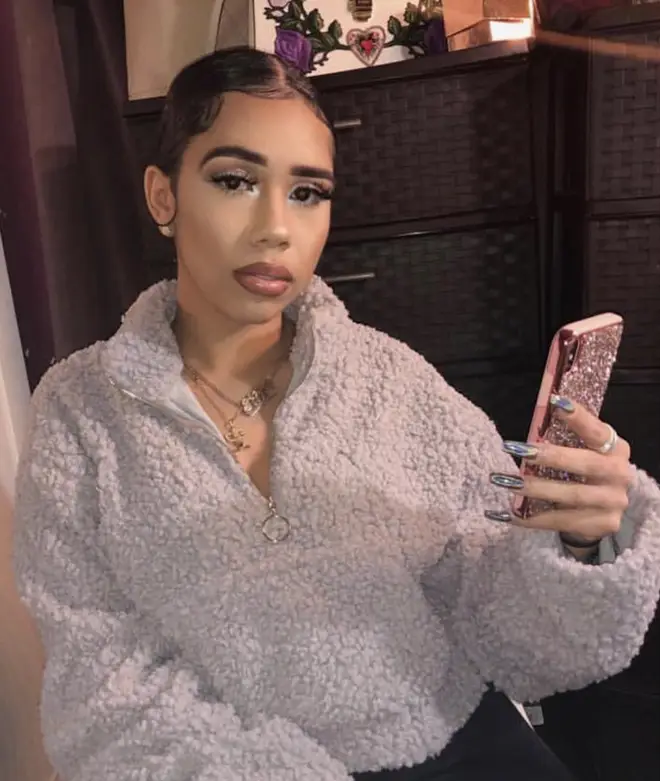 Molina claims the rapper gave her "hush money" after he beat her.