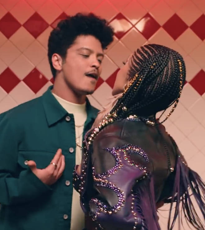 Cardi and Bruno get acquainted in "Please Me" visuals