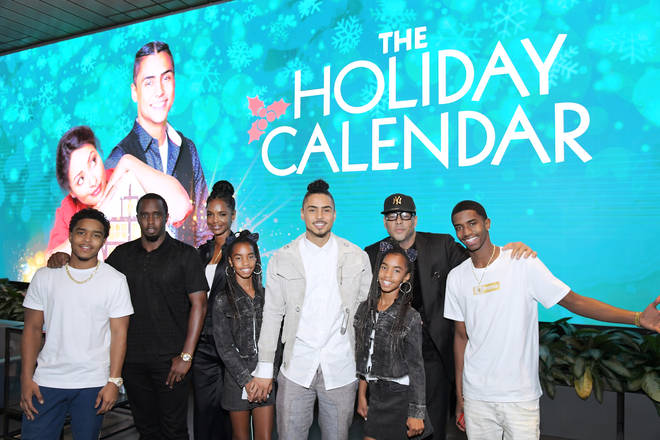 P Diddy and Kim Porter celebrate Quincy Jones starring in "The Holiday Calendar" with family