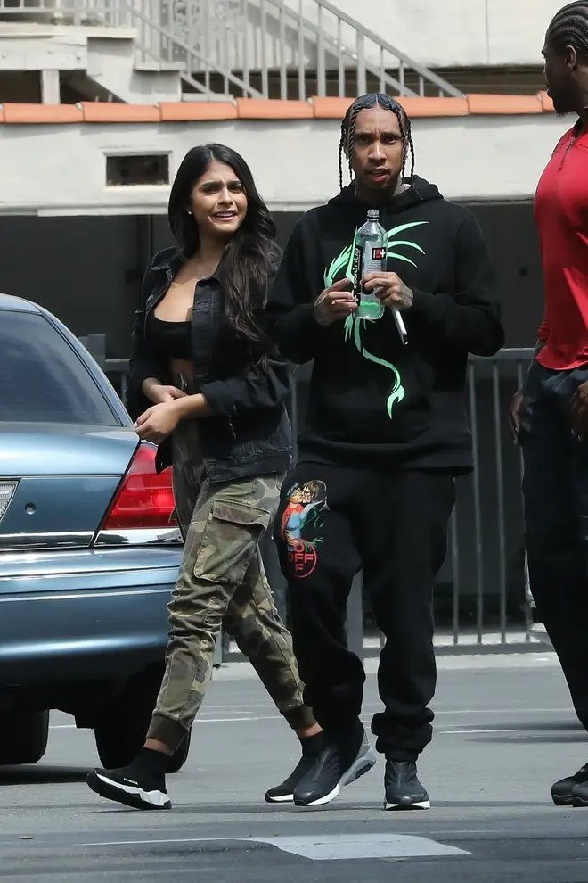 Tyga was spotted shopping on Rodeo Drive with his mystery woman.