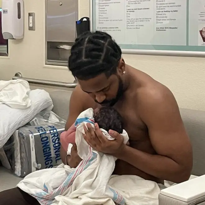 Big Sean gave his son kisses in the welcome room.