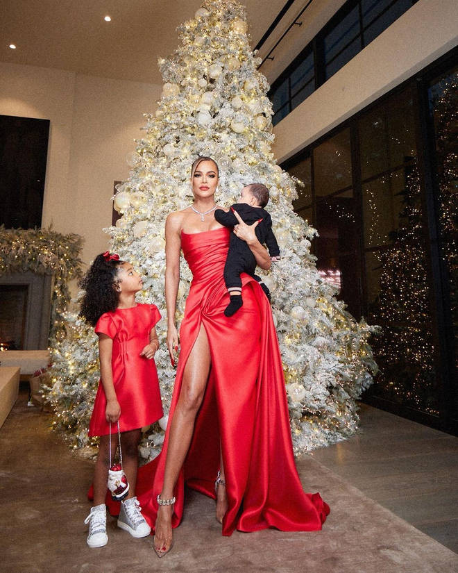 Khloe Kardashian shared a glimpse of her baby boy in photos taken on the night of the annual Kardashian Christmas Eve party.