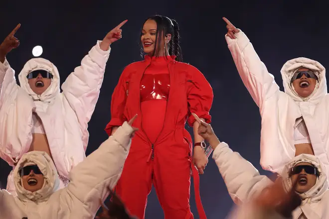 Dancers dressed in white surrounded her during her comeback show.