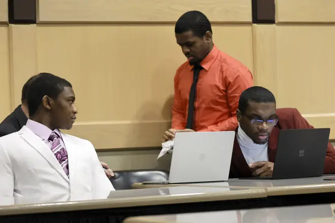 Suspects Michael Boatwright, Dedrick Williams and Trayvon Newsome seen in court.