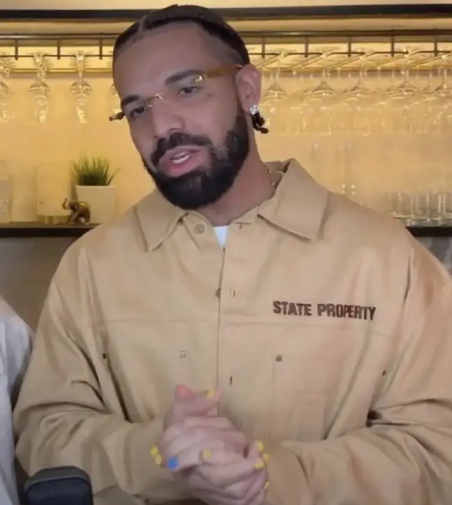 Drake was seen with a yellow and blue manicure recently.