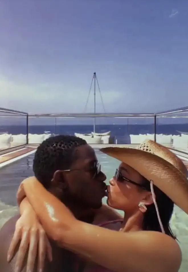The pair smooched on board the luxury yacht.