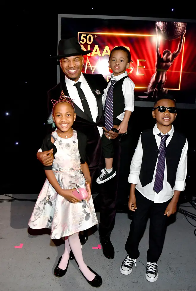 Ne-Yo with 3 of his 7 children.