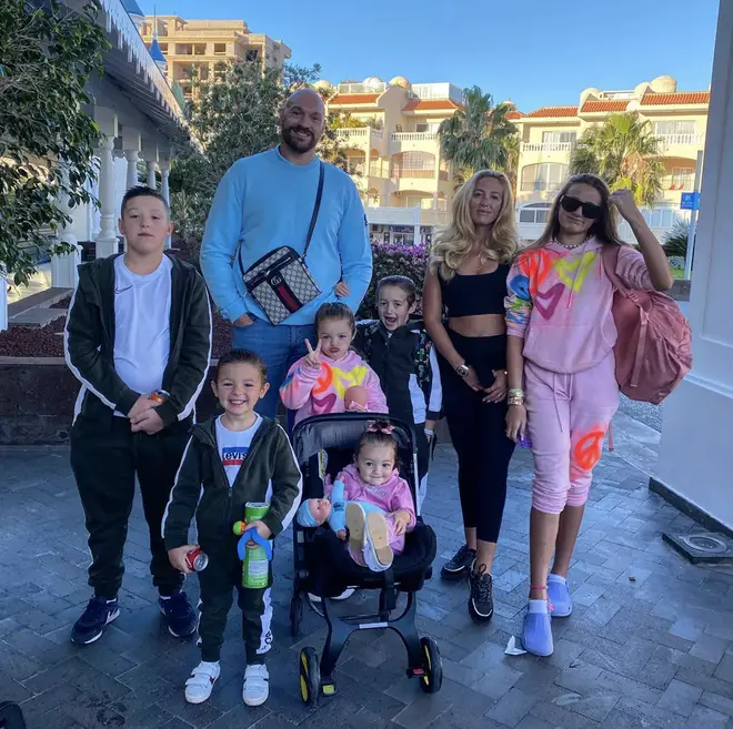 Tyson and Paris with their children.