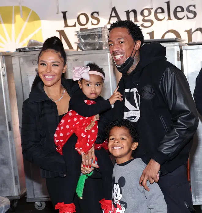 Brittany Bell, Nick Cannon and children Powerful Queen Cannon and Golden Cannon attend the Los Angeles Mission's Annual Christmas Celebration at the Los Angeles Mission on December 23, 2022 in Los Angeles, California.
