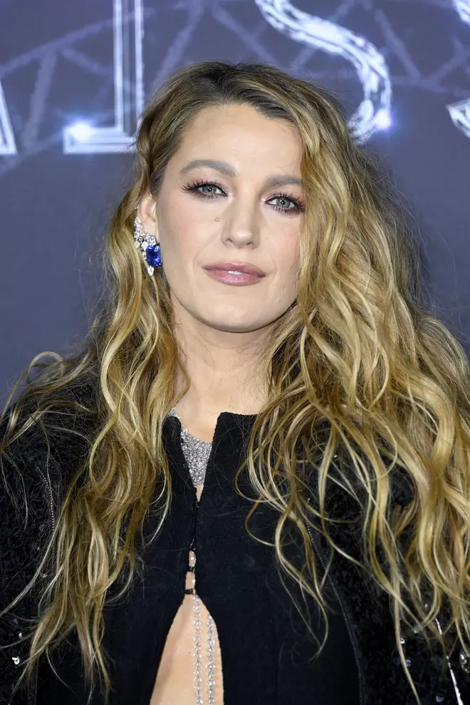 Blake Lively wore a black number with blue accesories.