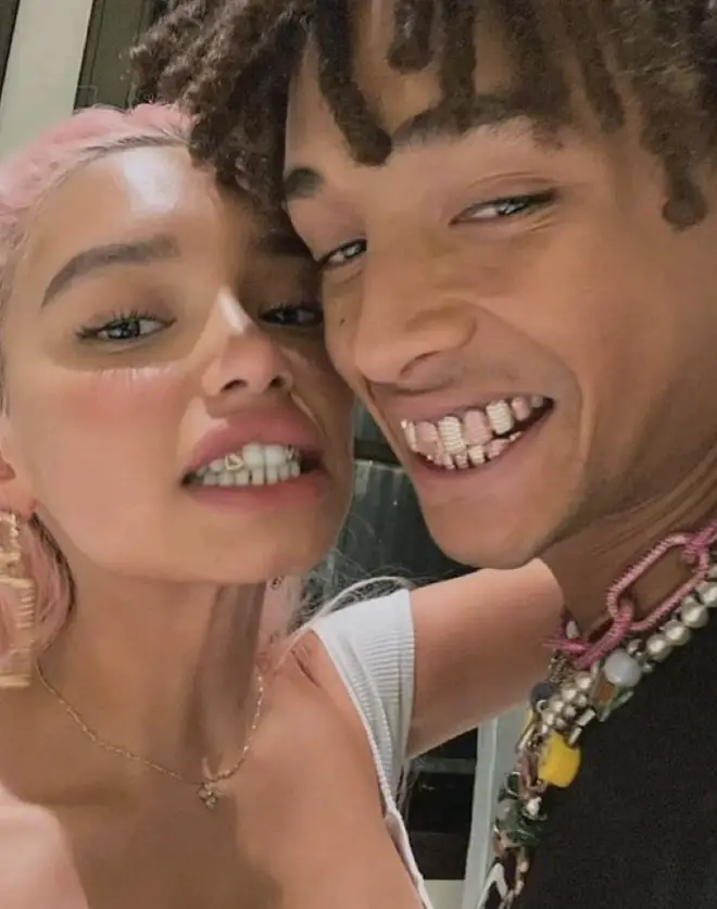 The pair shared a selfie sporting matching grills.