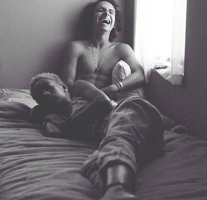The photo, posted in 2014, shows Willow, then 13, lying on a bed with former Disney actor Moises Arias, then 20.