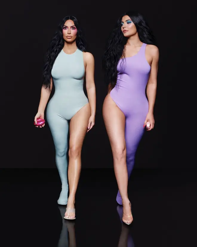 Kim Kardashian and half-sister Kylie Jenner strut their stuff for their new campaign - but an apparent photoshop blunder left fans questioned why they appeared to have 'six toes'.