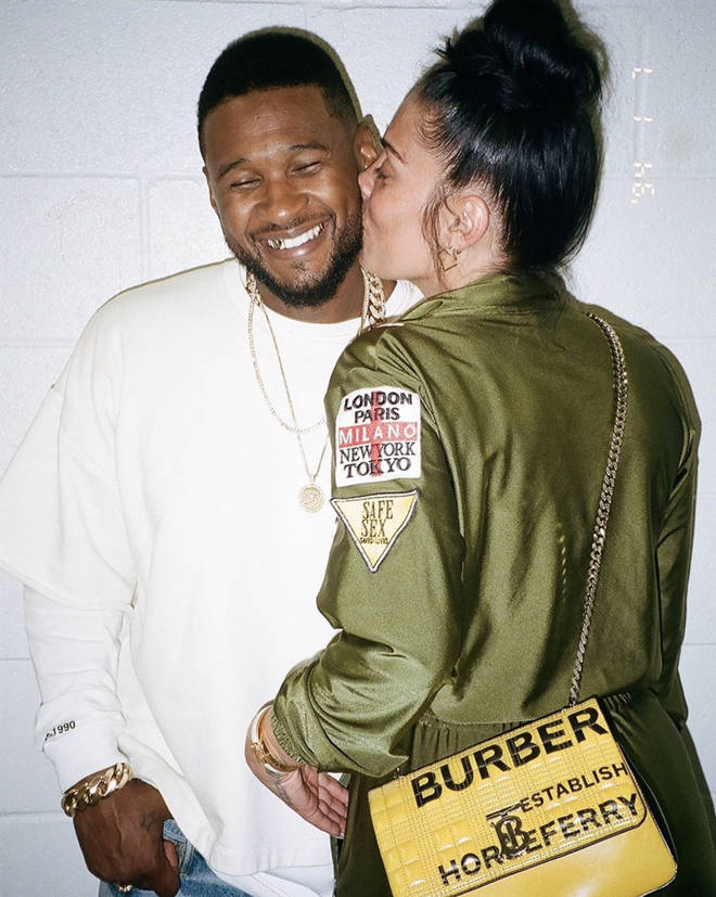 Usher has sparked dating rumours after being spotted getting a kiss from his new boo.