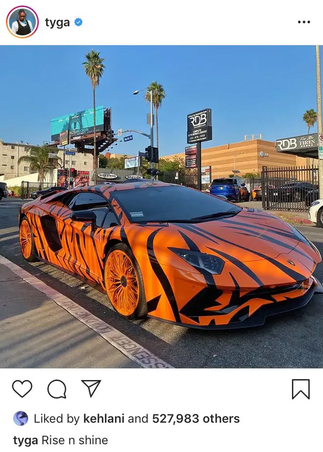 "Rise n Shine" wrote Tyga alongside a picture of his tiger-wrapped sportscar.
