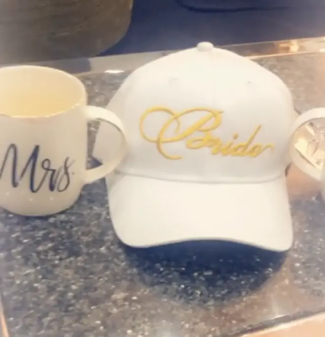 Minaj shared a clip of the couple's matching 'Mr and Mrs' coffee mugs and 'Bride and Groom' baseball caps.