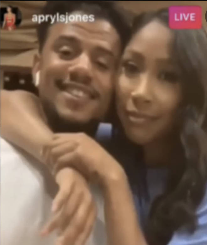 Apryl Jones & Lil Fizz hugging on Instagram Live